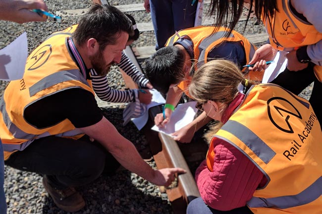 Students inspecting track at the latest Rail Careers Day